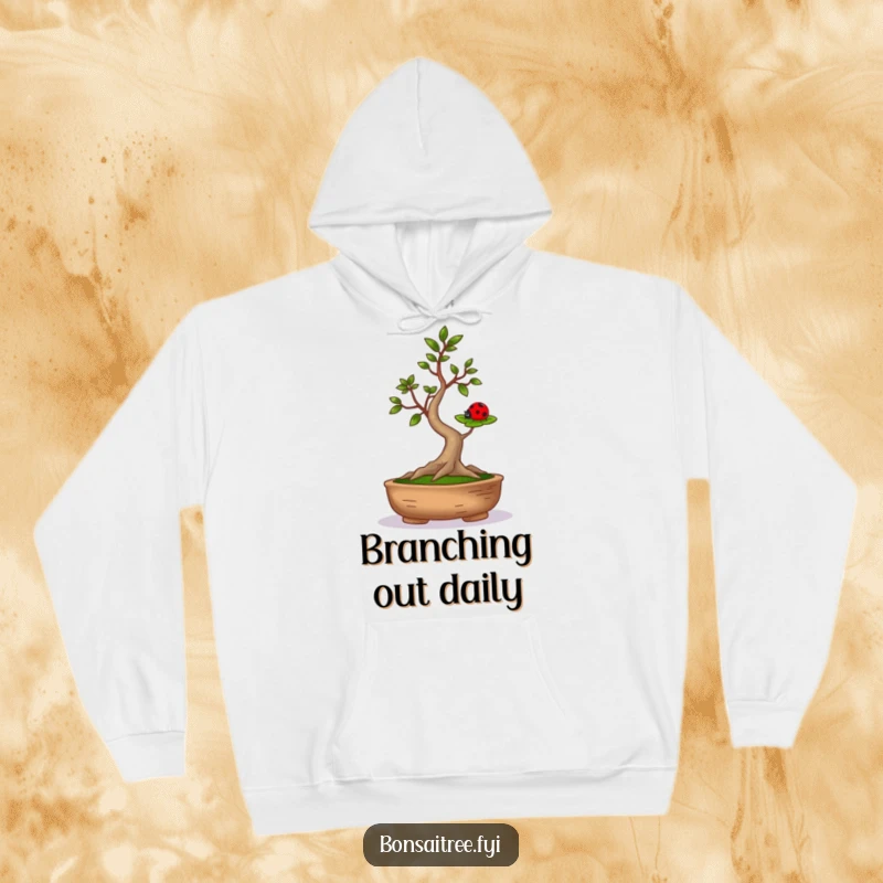 Funny, cozy hoodie featuring a bonsai tree arms-outstretched balancing a ladybug on a leaf, embodying playful nature humor.
