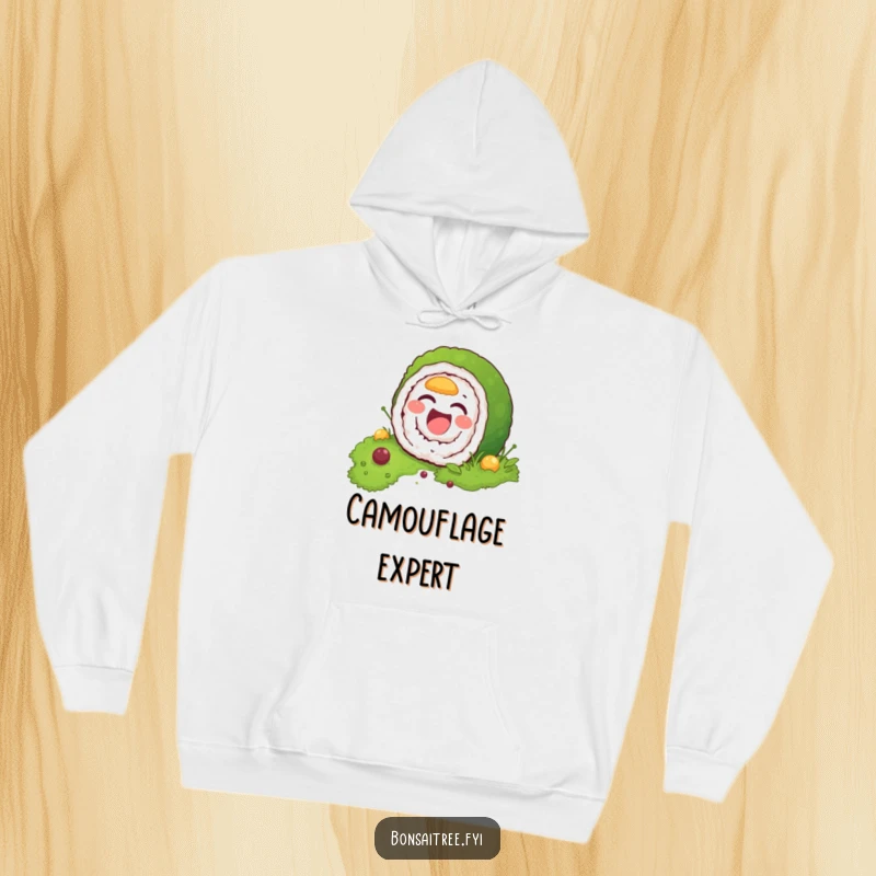 Funny hoodie illustration of a laughing sushi roll character attempting to camouflage itself within a textured mossy background, a comical sight.