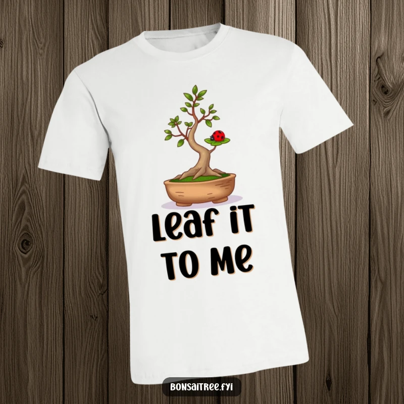 Funny graphic tee showing a zen bonsai tree with arms up, balancing a small ladybug on a leaf, perfect for nature lovers.