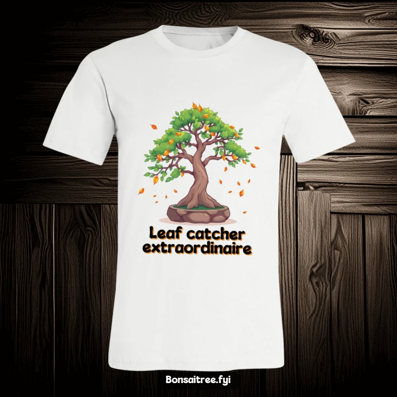 Funny Leaf-Catching Bonsai Tree T-Shirt: A bonsai with extended branches gracefully catches falling leaves, showcasing a humorous and serene design.